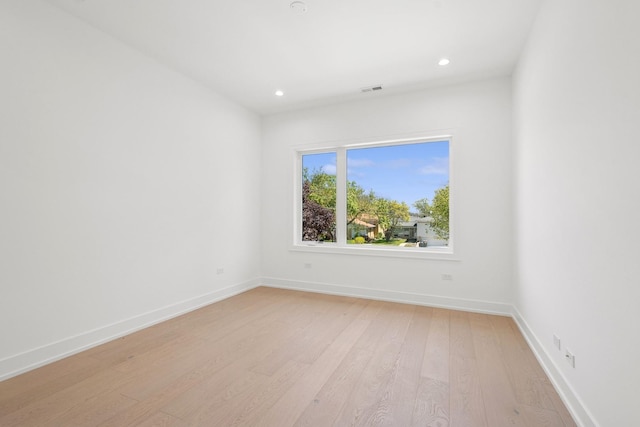 9214 N Washington St, Niles, IL 60714 - spare room featuring light wood-style flooring, recessed lighting, and baseboards