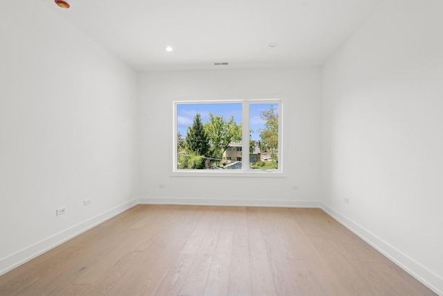 9214 N Washington St, Niles, IL 60714 - unfurnished room with light wood-style flooring, baseboards, and recessed lighting