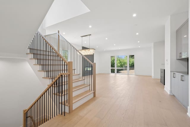 9214 N Washington St, Niles, IL 60714 - stairway with wood finished floors and recessed lighting