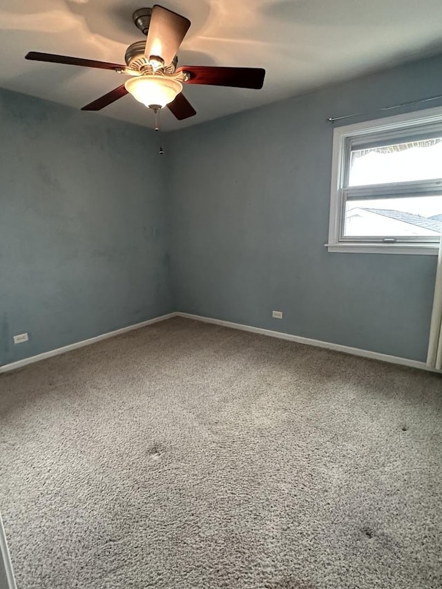 11024 Mason Ave, Chicago Ridge, IL 60415 - carpeted spare room featuring ceiling fan and baseboards