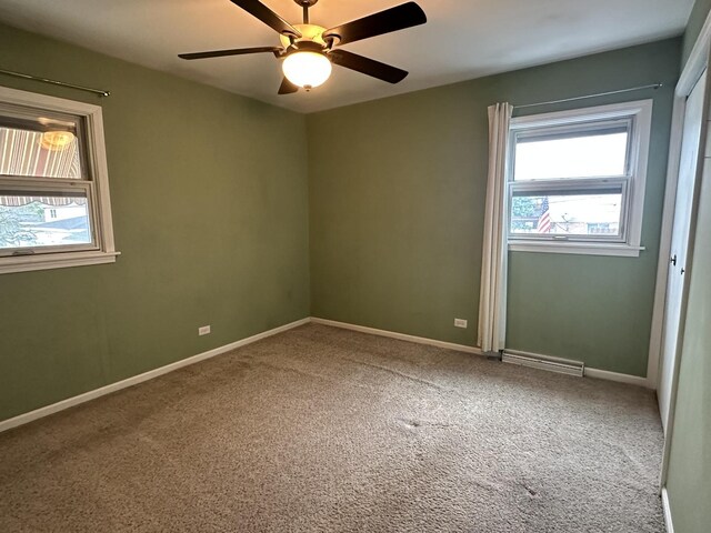11024 Mason Ave, Chicago Ridge, IL 60415 - carpeted spare room with ceiling fan and baseboards