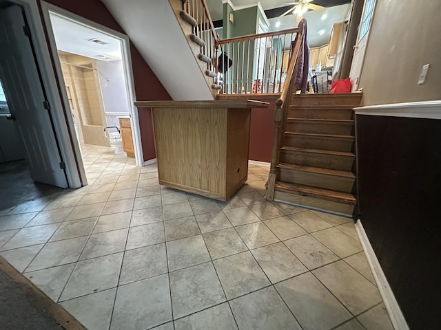 11024 Mason Ave, Chicago Ridge, IL 60415 - staircase with tile patterned floors and a ceiling fan