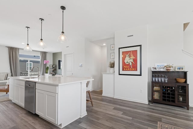 2011 Sequoia Ave, Mundelein, IL 60060 - kitchen featuring stainless steel dishwasher, wood finished floors, white cabinetry, a sink, and recessed lighting