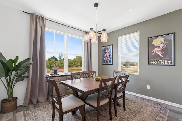 2011 Sequoia Ave, Mundelein, IL 60060 - dining space with wood finished floors, baseboards, and a chandelier