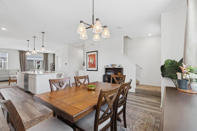2011 Sequoia Ave, Mundelein, IL 60060 - dining space featuring light wood finished floors, stairway, a chandelier, and recessed lighting