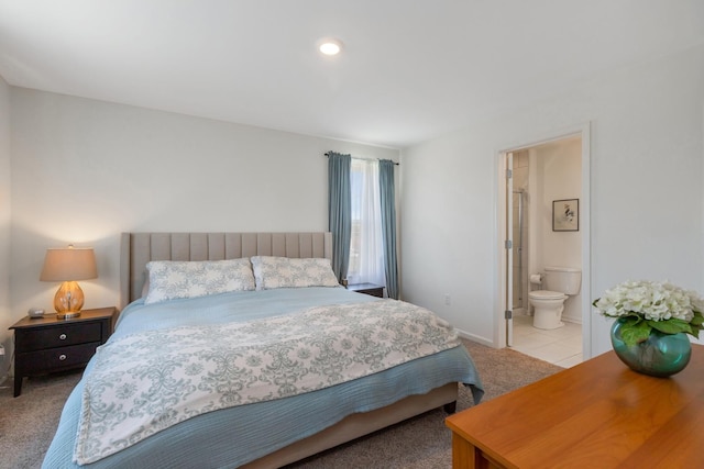 2011 Sequoia Ave, Mundelein, IL 60060 - carpeted bedroom with ensuite bathroom and baseboards