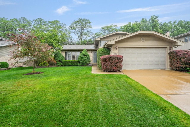 291 Georgetown Ave, Romeoville, IL 60446 - view of front of house featuring a garage, driveway, and a front lawn