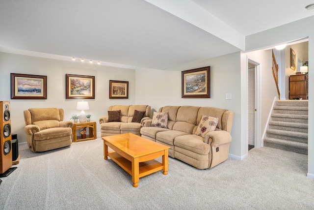291 Georgetown Ave, Romeoville, IL 60446 - living area featuring carpet floors, stairway, baseboards, and rail lighting