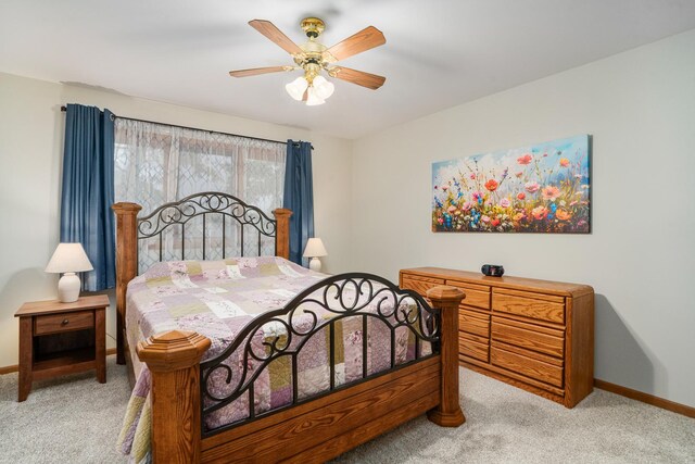 291 Georgetown Ave, Romeoville, IL 60446 - bedroom with light colored carpet, baseboards, and ceiling fan