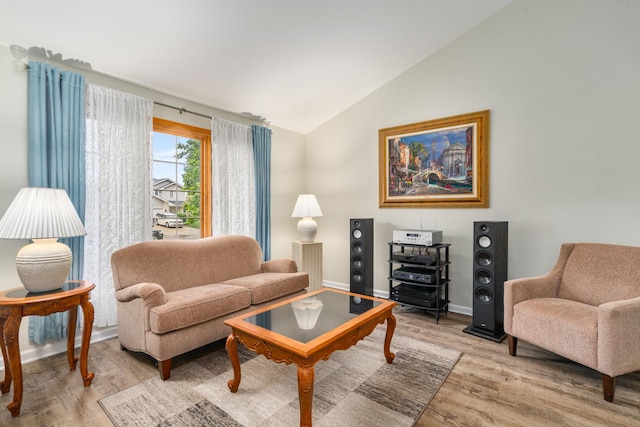 291 Georgetown Ave, Romeoville, IL 60446 - living room featuring vaulted ceiling, light wood-style flooring, and baseboards