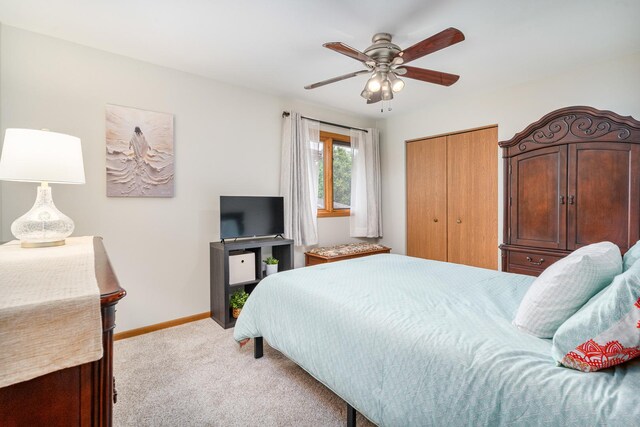 291 Georgetown Ave, Romeoville, IL 60446 - bedroom with light colored carpet, baseboards, a closet, and ceiling fan