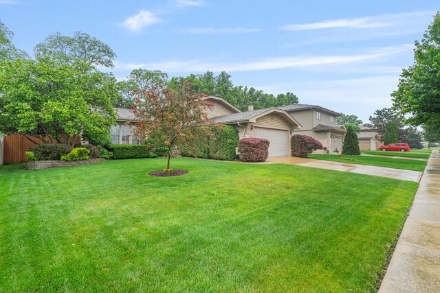 291 Georgetown Ave, Romeoville, IL 60446 - view of front of property featuring driveway, a garage, and a chimney