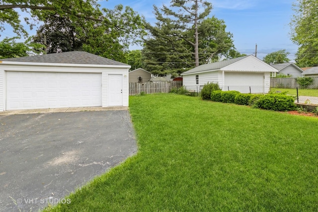 106 N Berteau Ave, Bartlett, IL 60103 - view of yard with a garage and an outdoor structure