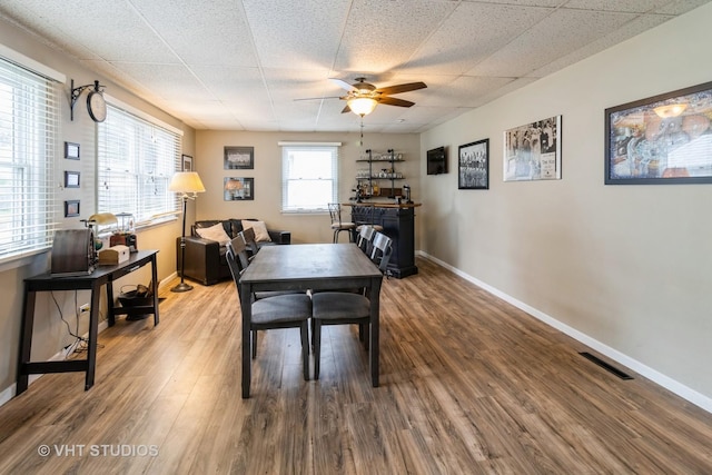 106 N Berteau Ave, Bartlett, IL 60103 - home office featuring ceiling fan, wood finished floors, and baseboards