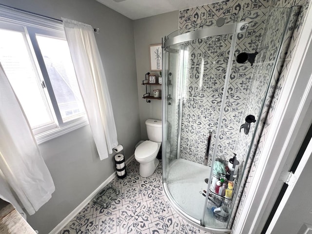 7003 94th Ave, Kenosha, WI 53142 - full bathroom with toilet, a shower stall, tile patterned flooring, and baseboards