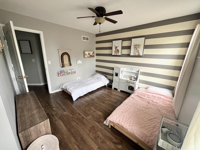 7003 94th Ave, Kenosha, WI 53142 - bedroom featuring dark wood finished floors, baseboards, and a ceiling fan