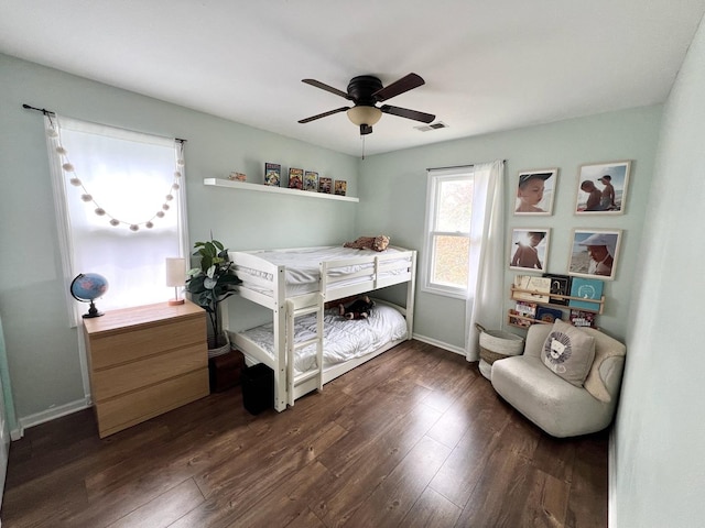 7003 94th Ave, Kenosha, WI 53142 - bedroom with dark wood-type flooring, baseboards, and ceiling fan