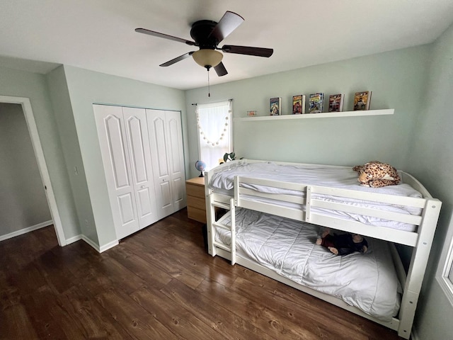 7003 94th Ave, Kenosha, WI 53142 - bedroom with a closet, wood finished floors, ceiling fan, and baseboards