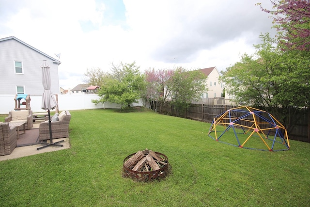 7003 94th Ave, Kenosha, WI 53142 - view of yard featuring a fire pit and a patio area