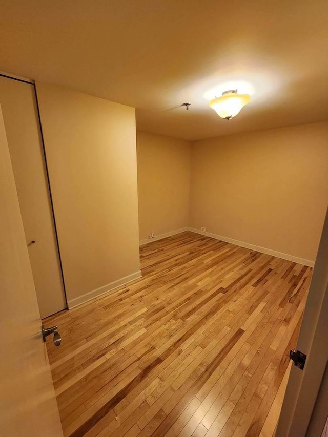 680 N Lake Shore Dr Unit 716, Chicago, IL 60611 - unfurnished room with light wood-style floors and baseboards