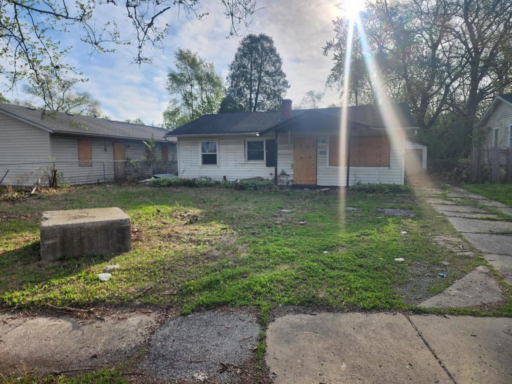 15725 Hoyne Ave, Harvey, IL 60426 - ranch-style house featuring a chimney and dirt driveway