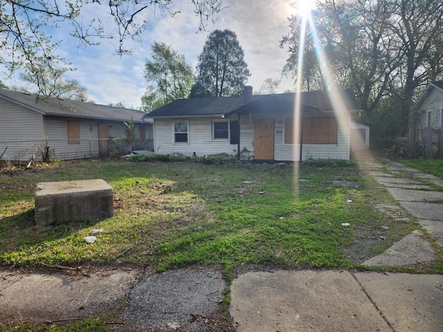 15725 Hoyne Ave, Harvey, IL 60426 - ranch-style house featuring a chimney and dirt driveway