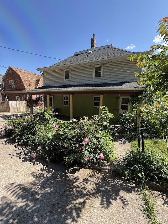 428 Chicago Ave, Savanna, IL 61074 - rear view of property featuring a chimney