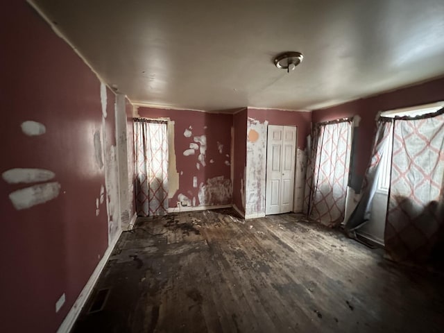241 156th St, Calumet City, IL 60409 - foyer featuring baseboards, plenty of natural light, and wood finished floors
