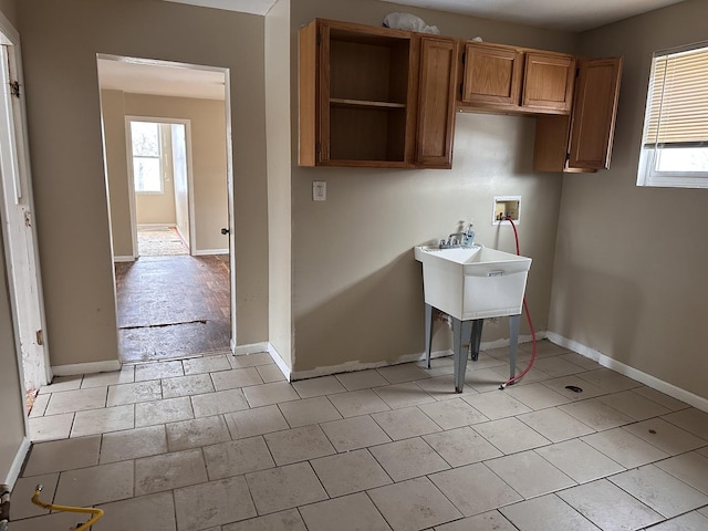 241 156th St, Calumet City, IL 60409 - laundry area featuring hookup for a washing machine, healthy amount of natural light, and baseboards