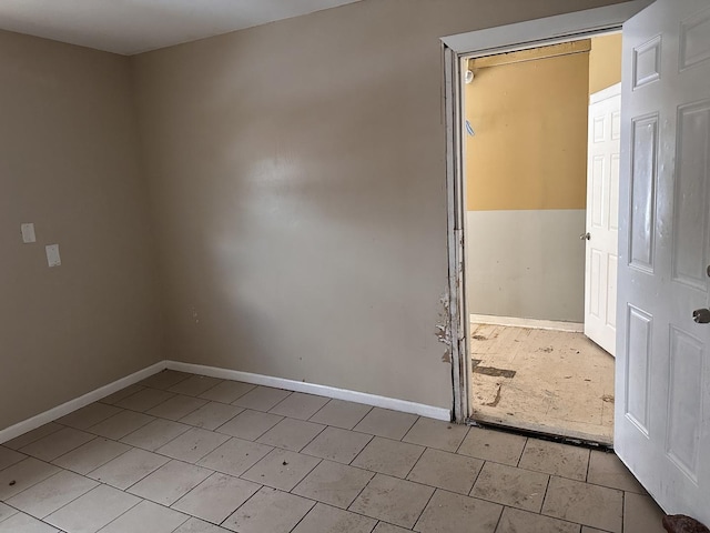 241 156th St, Calumet City, IL 60409 - unfurnished room with baseboards and light tile patterned floors