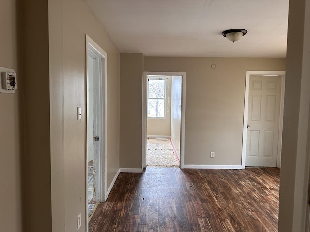 241 156th St, Calumet City, IL 60409 - empty room featuring dark wood-type flooring and baseboards