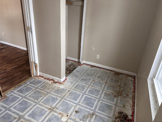 241 156th St, Calumet City, IL 60409 - unfurnished bedroom featuring baseboards and a closet