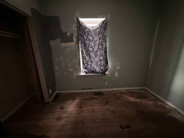 241 156th St, Calumet City, IL 60409 - unfurnished bedroom with hardwood / wood-style floors and baseboards