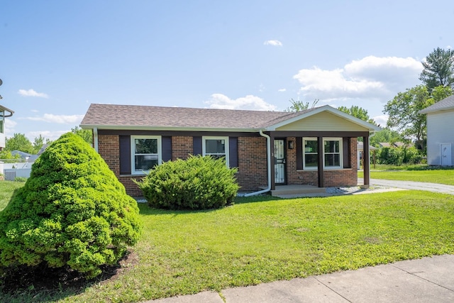 5831 Allemong Dr, Matteson, IL 60443 - ranch-style house with brick siding, a front yard, and a porch