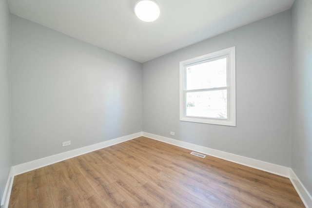 5831 Allemong Dr, Matteson, IL 60443 - unfurnished room with wood finished floors and baseboards