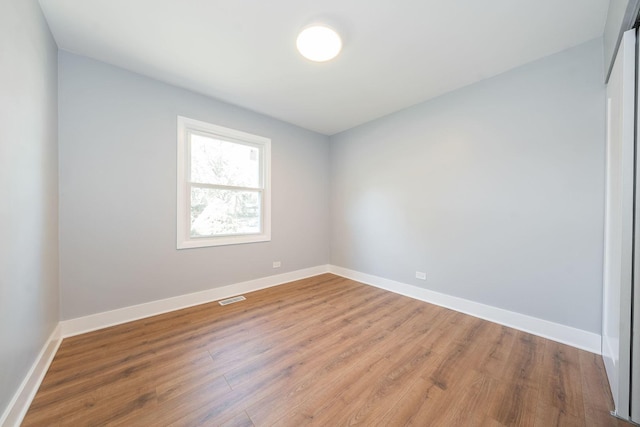 5831 Allemong Dr, Matteson, IL 60443 - unfurnished room with wood finished floors and baseboards