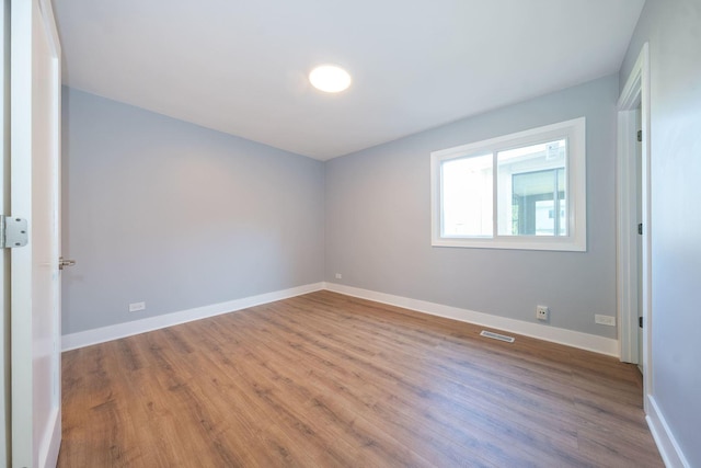 5831 Allemong Dr, Matteson, IL 60443 - empty room with wood finished floors and baseboards