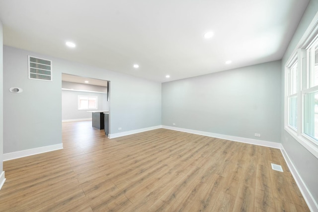 5831 Allemong Dr, Matteson, IL 60443 - empty room featuring light wood-type flooring, recessed lighting, and baseboards