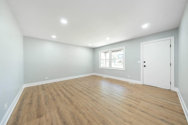 5831 Allemong Dr, Matteson, IL 60443 - empty room with wood finished floors, recessed lighting, and baseboards