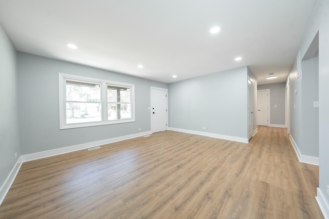 5831 Allemong Dr, Matteson, IL 60443 - spare room featuring light wood-style floors, recessed lighting, and baseboards