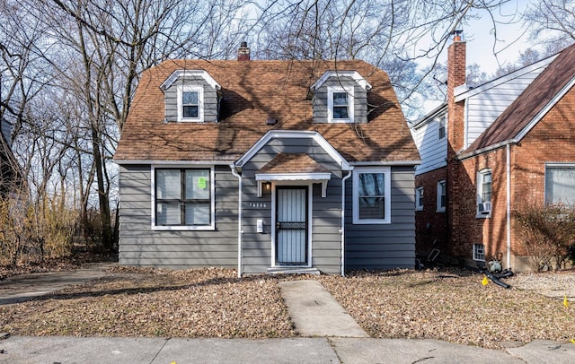 14746 Princeton Ave, Dolton, IL 60419 - view of front facade featuring a chimney and a shingled roof