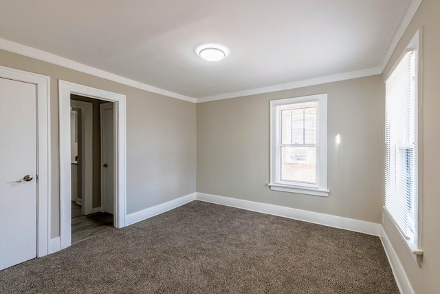 14746 Princeton Ave, Dolton, IL 60419 - spare room with dark carpet, crown molding, and baseboards