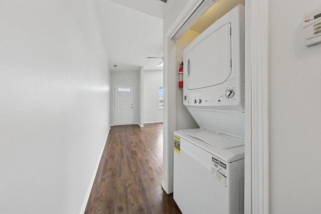 519 S Maplewood Ave Unit 4S, Chicago, IL 60612 - laundry area featuring estacked washer and dryer, dark wood finished floors, and baseboards