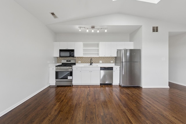 519 S Maplewood Ave Unit 4S, Chicago, IL 60612 - kitchen featuring stainless steel appliances, open shelves, a sink, backsplash, and light countertops