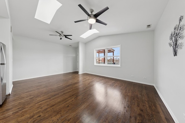 519 S Maplewood Ave Unit 4S, Chicago, IL 60612 - empty room with a skylight, ceiling fan, vaulted ceiling, dark wood finished floors, and baseboards