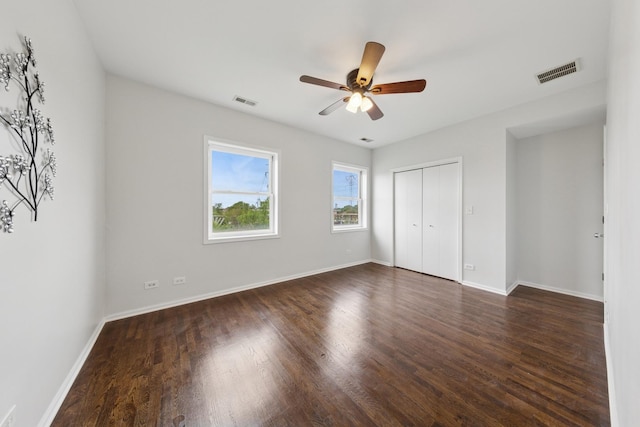 519 S Maplewood Ave Unit 4S, Chicago, IL 60612 - unfurnished bedroom featuring dark wood-type flooring, a closet, and baseboards