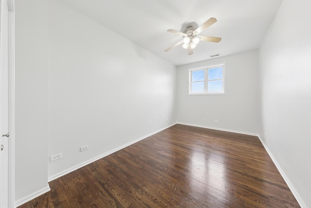 519 S Maplewood Ave Unit 4S, Chicago, IL 60612 - empty room with dark wood finished floors, ceiling fan, and baseboards