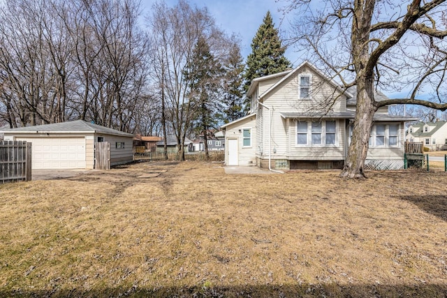 14446 Martin Luther King Jr Dr, Dolton, IL 60419 - view of home's exterior with a garage and an outbuilding