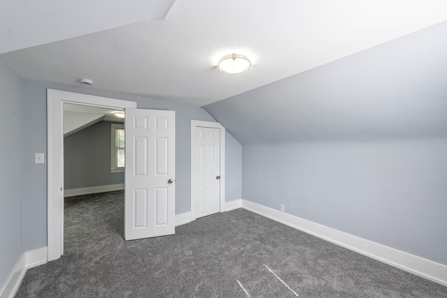 14446 Martin Luther King Jr Dr, Dolton, IL 60419 - bonus room with lofted ceiling, dark carpet, and baseboards