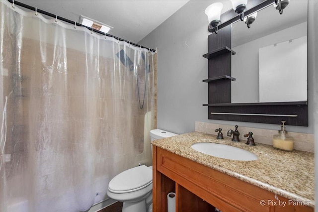 405 S Belmont Ave, Elgin, IL 60123 - bathroom with toilet, vanity, and a shower with curtain